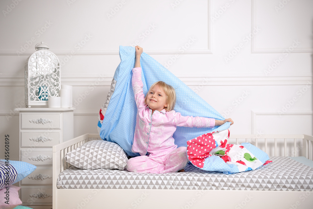 Beautiful baby girl sleeping in her bed and waking up Beautiful baby girl sleeping in her bed and waking up
