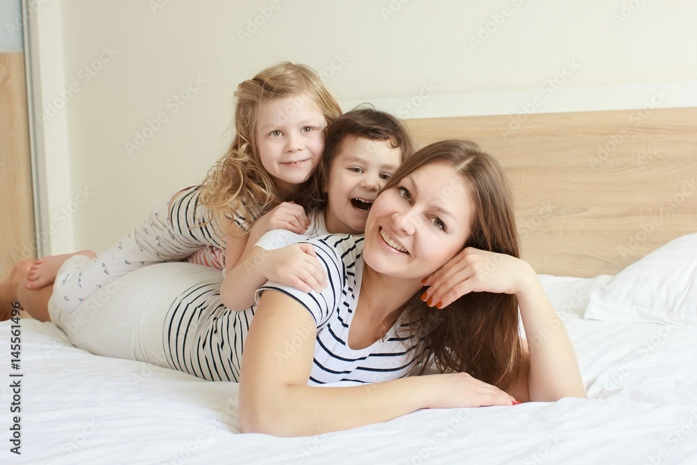 Happy loving family. Mother and her daughter child girl playing and hugging. Happy loving family. Mother and her daughter child girl playing and hugging.