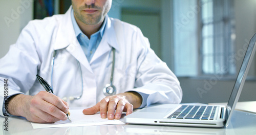 Photography Medium shoot on green screen chroma key of a male young doctor in a corridor wor