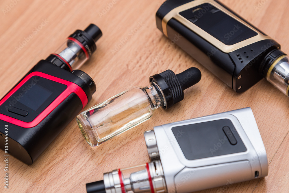 Vaping electronic mech mod and vape liquid. Vaping electronic mech mod and vape liquid.