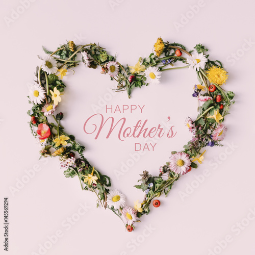 Heart of nature with happy Mothers day text. Love concept. Flat lay.