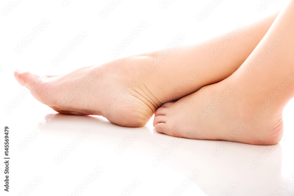 Naked woman foot on the floor Naked woman foot on the floor