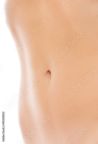 Slim nude young woman belly