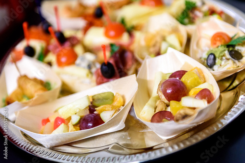 Home made canapes small sandwiches appetizers.