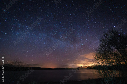 Milky Way above Fontburn Reservoir / Fontburn Reservoir in Northumberland is a popular place for fishing and walking, seen her under the stars at night