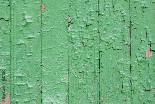 chipped paint on the door of the old boards, texture background