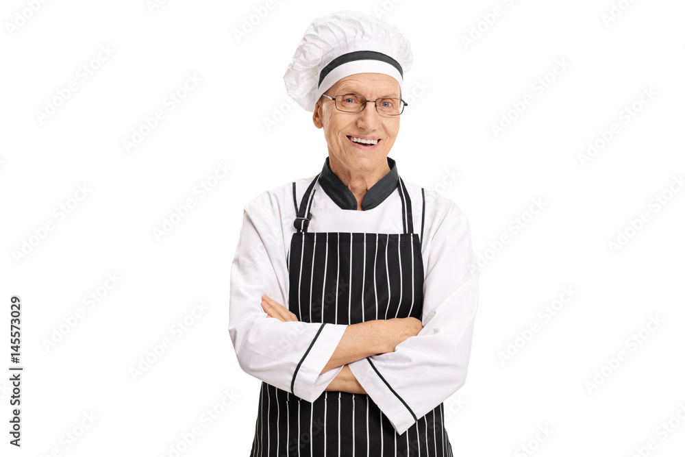 Elderly chef with his arms crossed
