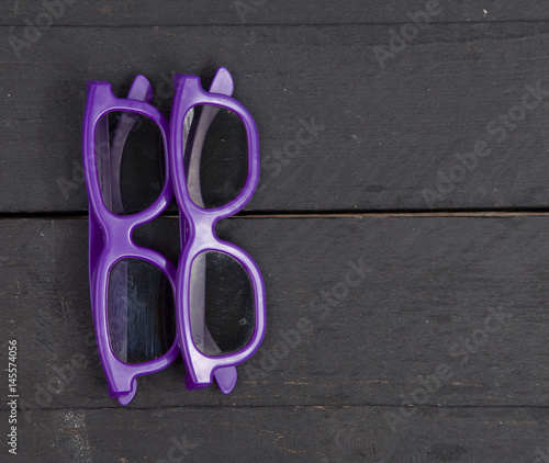 Two 3d glasses on wooden background