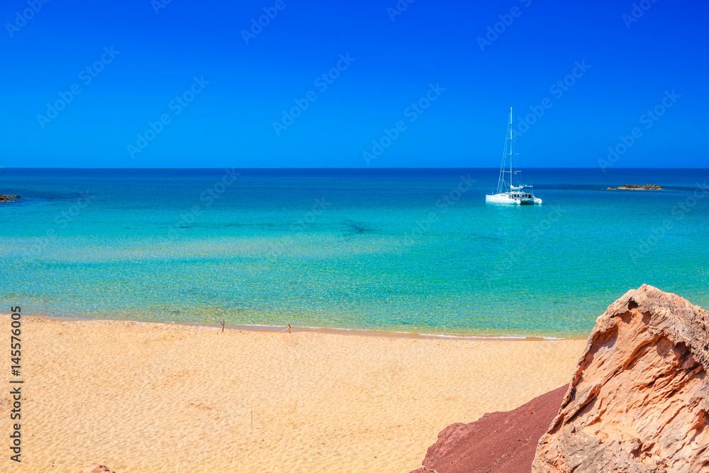 Cala del Pilar beach scenery on sunny summer day at Menorca, Spain.