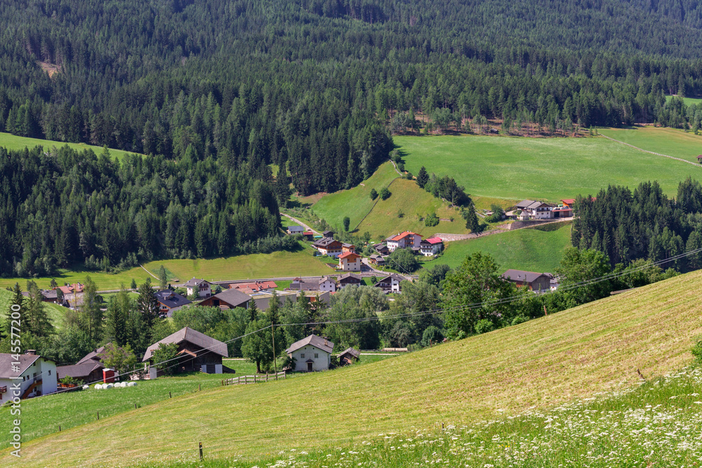 Typical mountain landscape and house in the Dolomites, south Tyrol