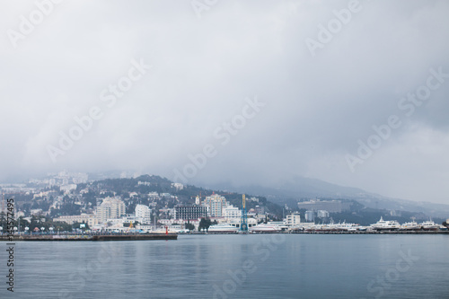 The promenade of Yalta. The port in the black sea. Cloudy weather on the black sea. The City Of Yalta- Crimea 