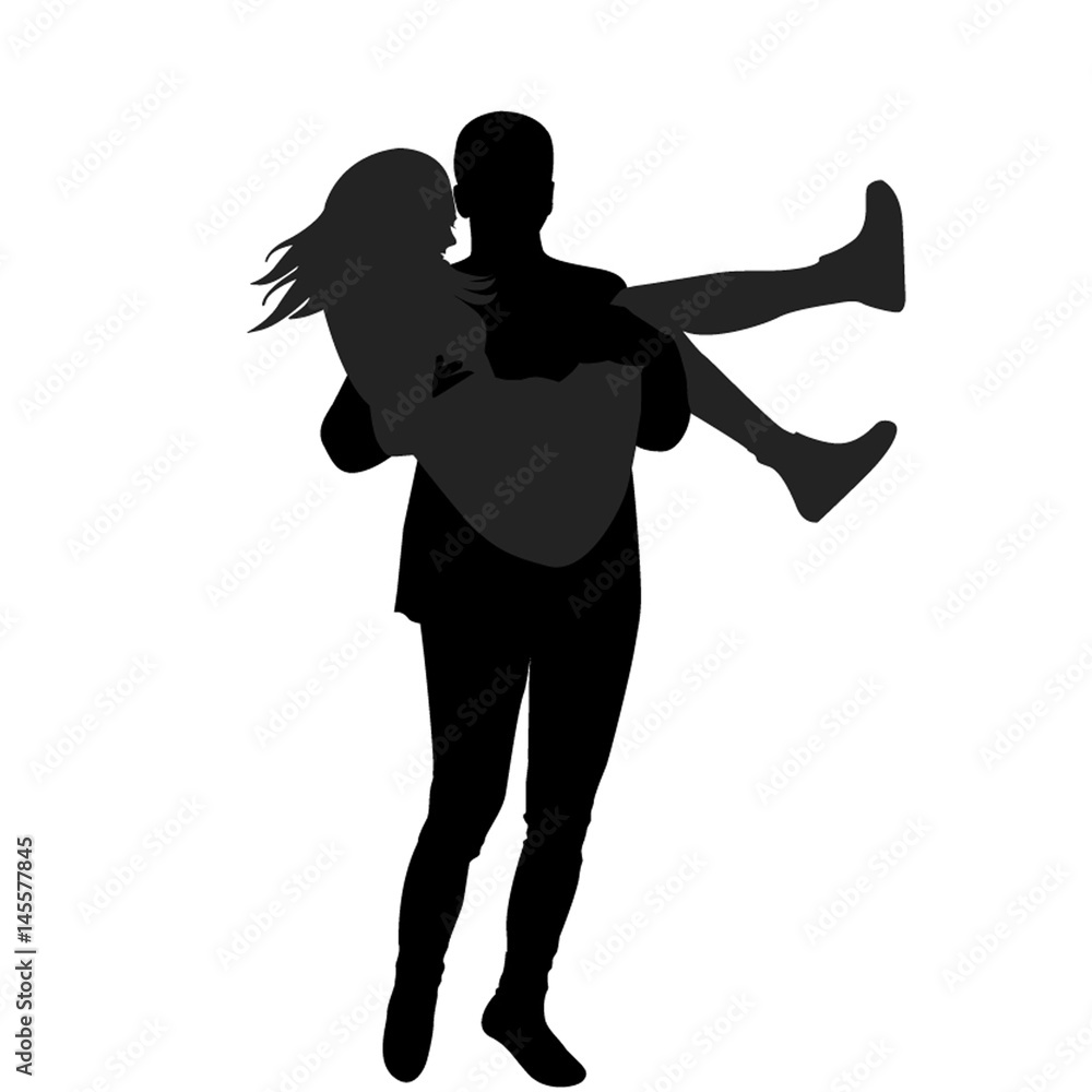 Man holding woman in his arms