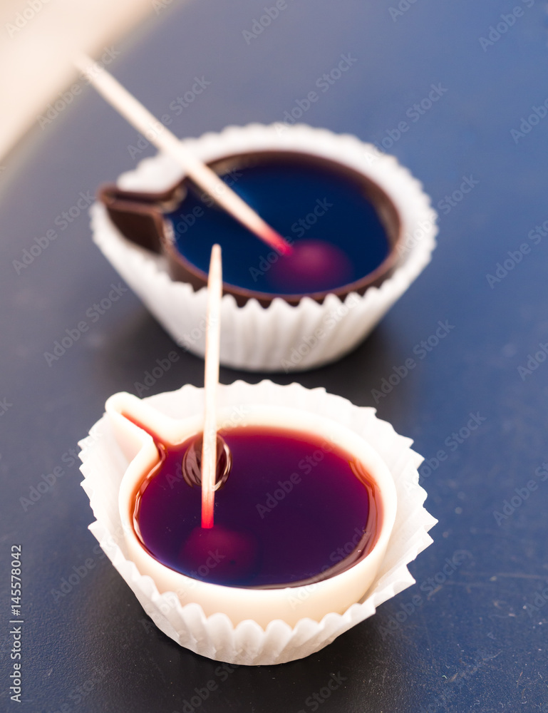 Ginja de Obidos, traditional sour cherry liquor, served in small cups made of chocolate