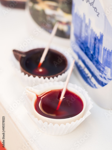 Ginja de Obidos, traditional sour cherry liquor, served in small cups made of chocolate