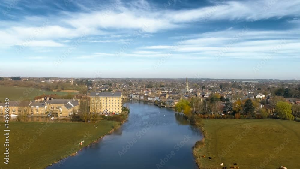 British market town by the river lift up revealing aerial shot British market town by the river lift up revealing aerial shot
