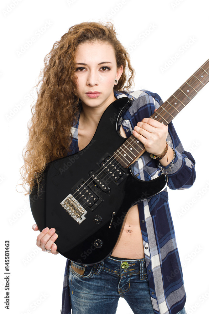 Young guitarist girl posing on white background; Young guitarist girl posing on white background;