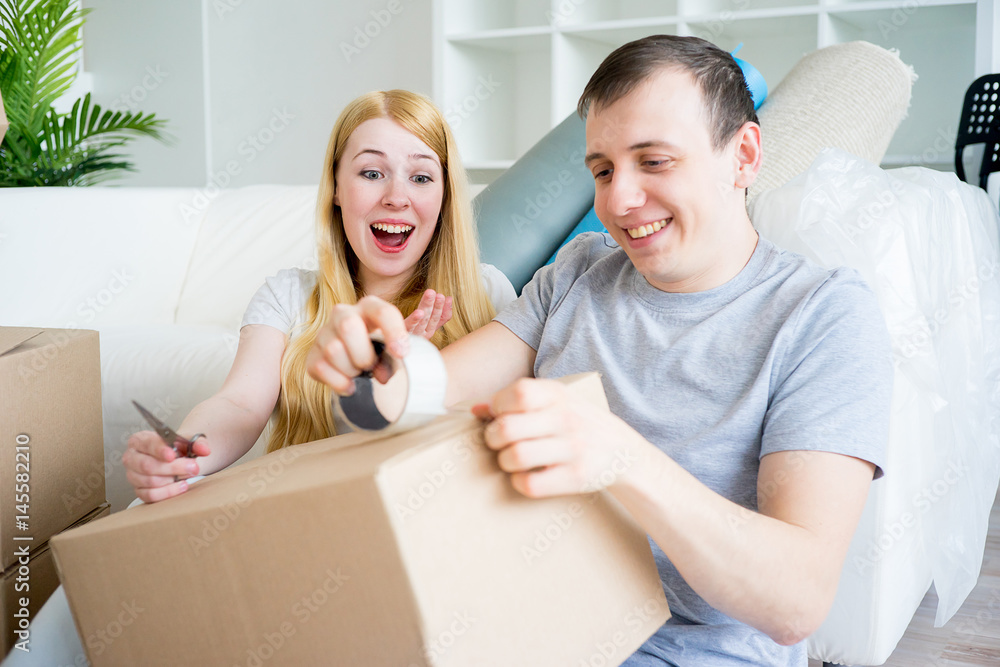 Couple moving into new house Couple moving into new house