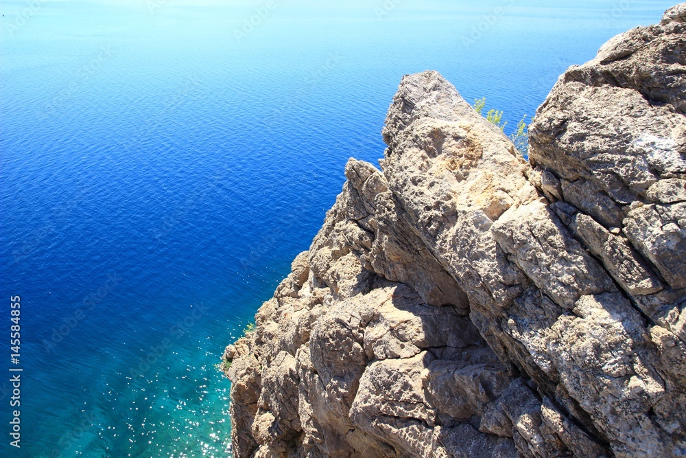 Rocks and sea. Adriatic coast near Karlobag in Croatia