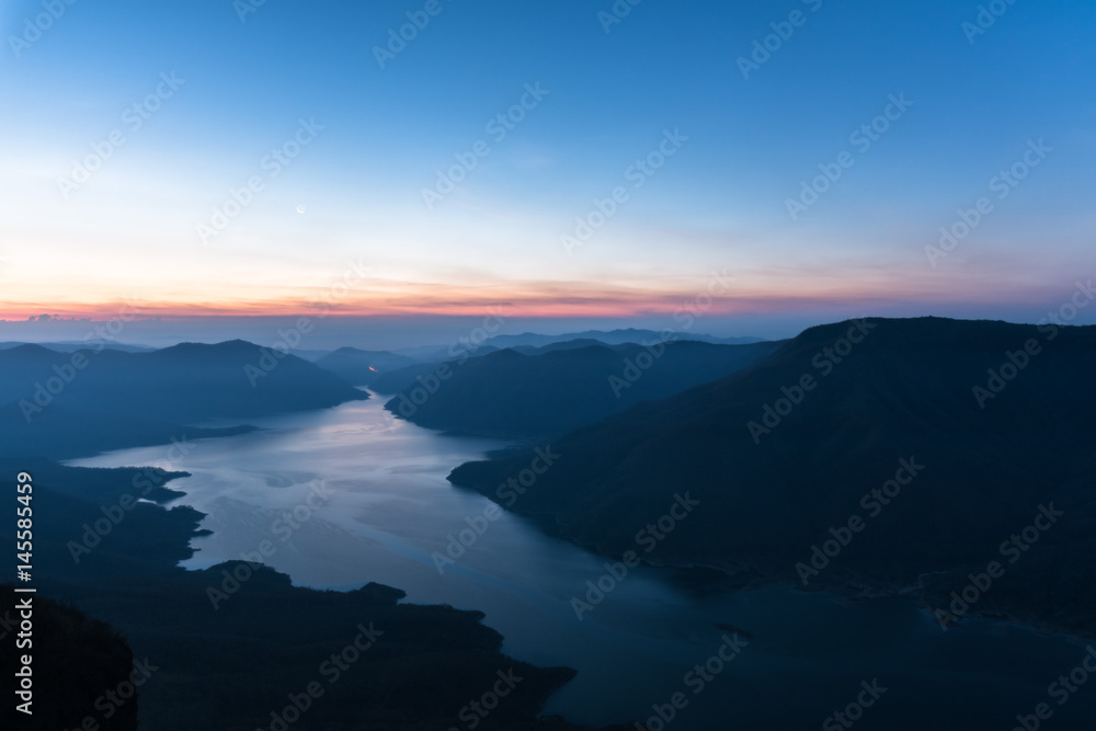 Mae Ping river view point. Sunrise above the lake and mountain.
