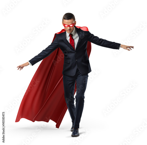 A superhero in a business suit and a red cape keeping his balance on an invisible rope.