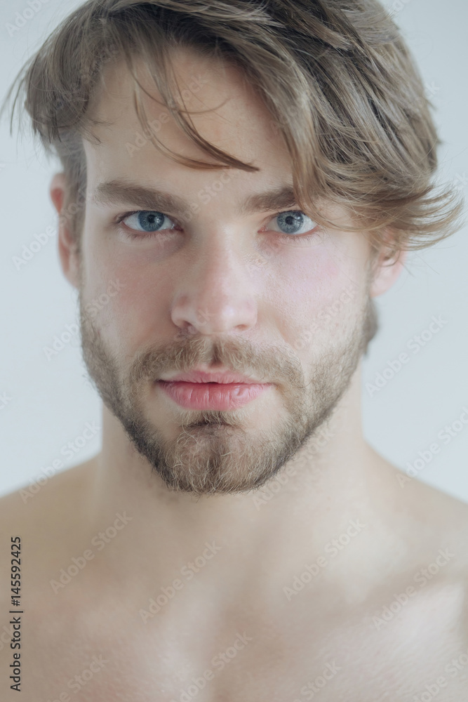Fototapeta premium Handsome bearded man with beard and stylish haircut