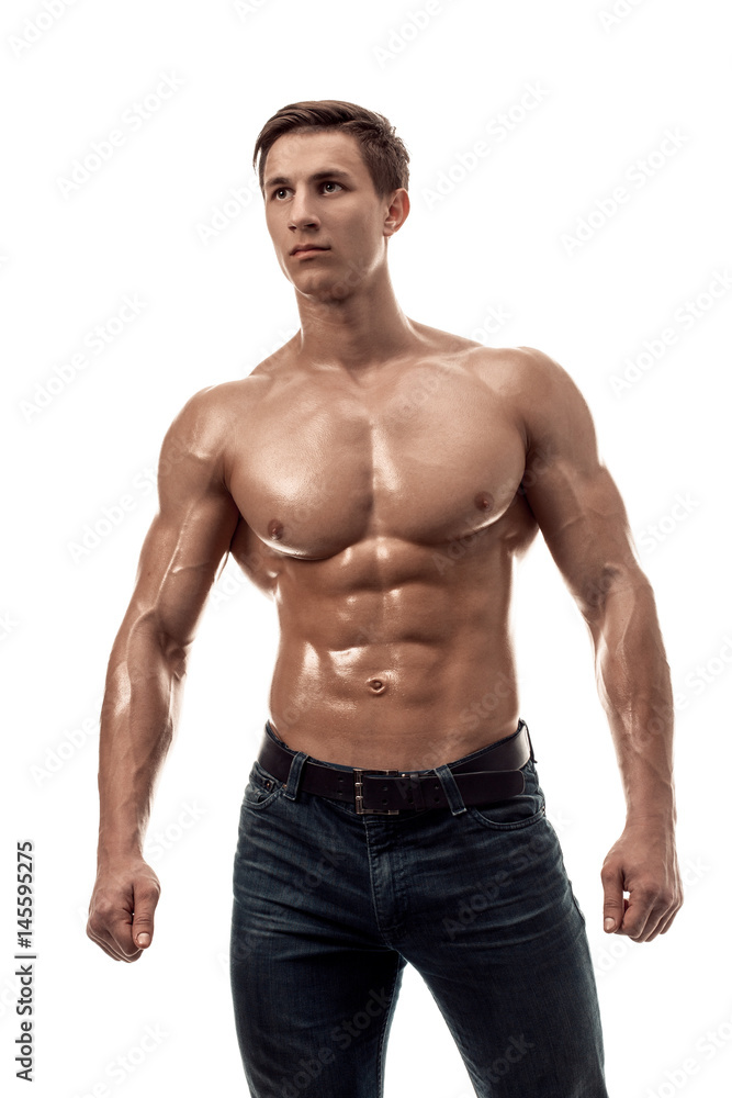 Muscular handsome young man with naked torso. Isolated on white background. Muscular handsome young man with naked torso. Isolated on white background.