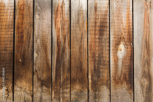 Old beautiful wooden fence in the village