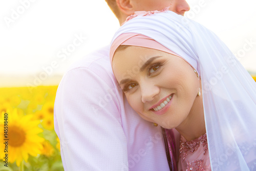 Bride and groom at a islamic wedding ceremony photo