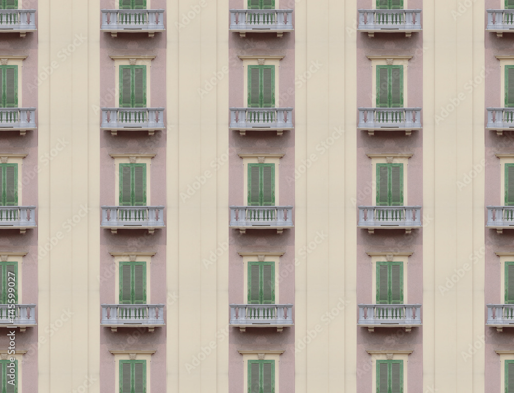 An endless facade (a wall full of identical windows). Easy photoshop trick.
