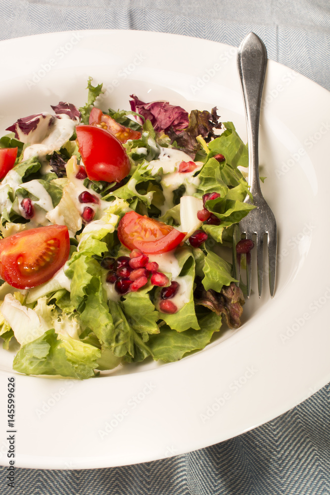 fresh salad with garlic cream sauce