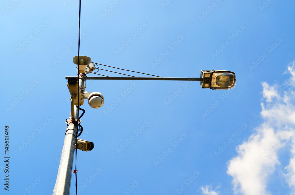 Loudspeaker and CCTV camera on lamp post Loudspeaker and CCTV camera on lamp post