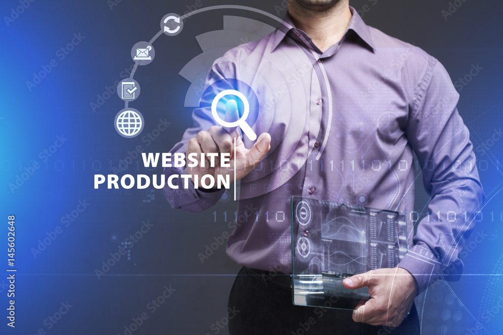 Business, Technology, Internet and network concept. Young businessman working on a virtual screen of the future and sees the inscription: Website production Business, Technology, Internet and network concept. Young businessman working on a virtual screen of the future and sees the inscription: Website production