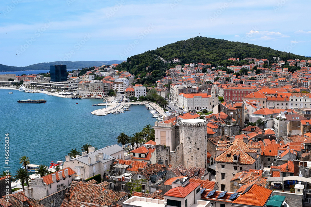 Orange rooftops and waterfront promenade of the Split Old Town before Marjan Hill, Croatia