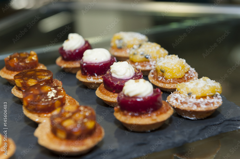small platter of fancy mini cakes small platter of fancy mini cakes