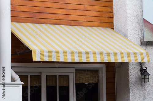 Canvas Print and white awning decor in front of the shop