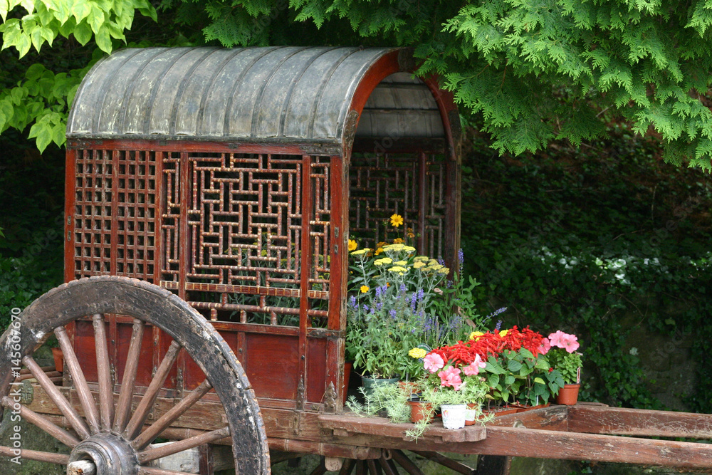 Oriental cart with flowers