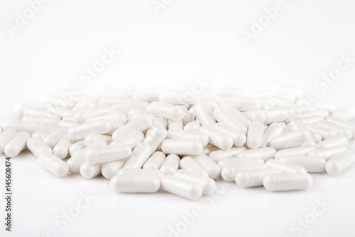 Принти на полотні Glucosamine caplets on a white surface