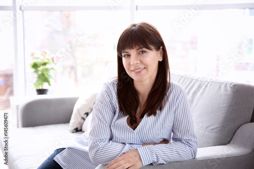 Beautiful mature woman at home Free Download Beautiful mature woman at home - GFXLoad
