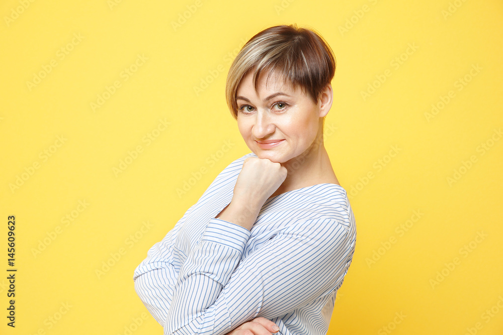 Beautiful mature woman on color background Beautiful mature woman on color background