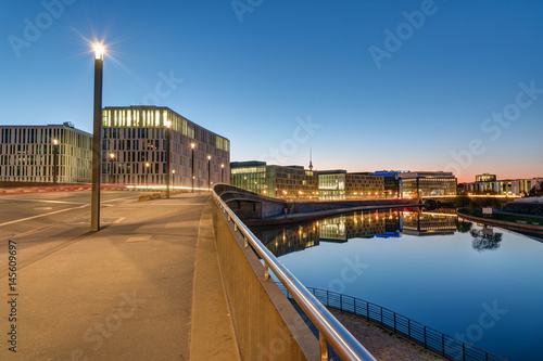 Bridge and office buildings at the river Spree in Berlin in the early morning