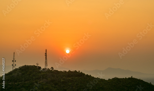 Sunset over mountain in evening