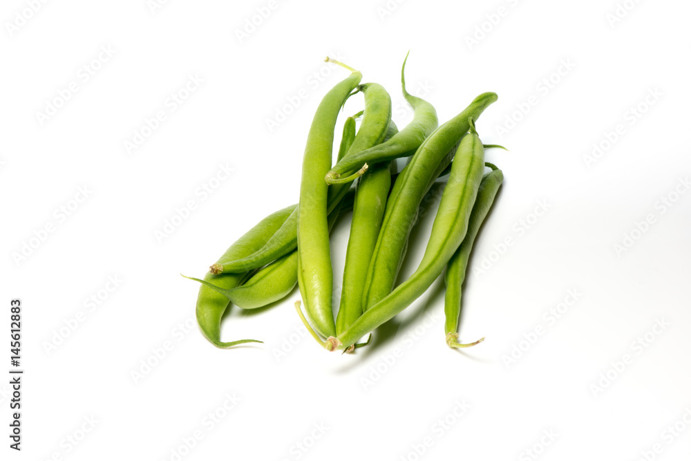 Close-up of green beans on a white background Close-up of green beans on a white background
