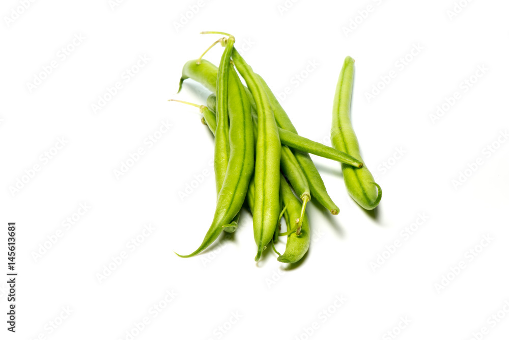 Close-up of green beans on a white background Close-up of green beans on a white background
