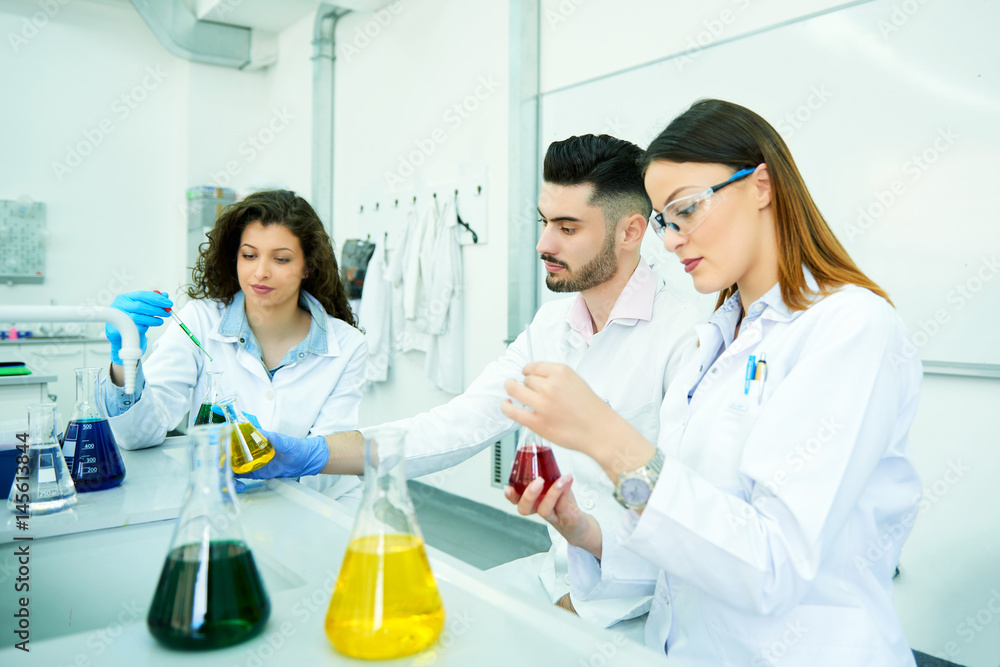 Group of students in the lab Group of students in the lab