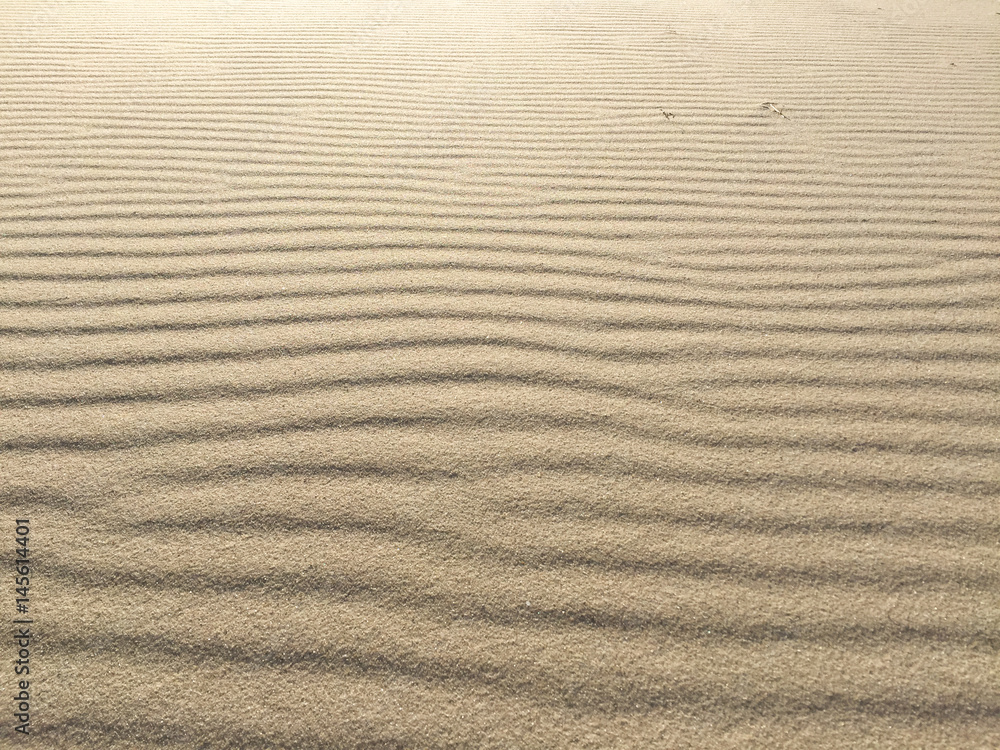 Beach sand - beach sand with waves of the blow of the wind Beach sand - beach sand with waves of the blow of the wind