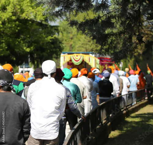 Procession of Sikh religion people during the celebration on the