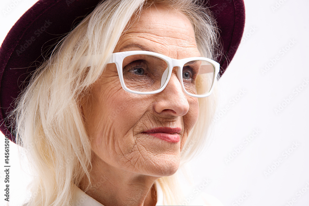 Fashioned old woman wearing headdress Fashioned old woman wearing headdress