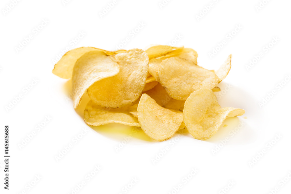Crispy potato chips isolated on white background close-up Crispy potato chips isolated on white background close-up
