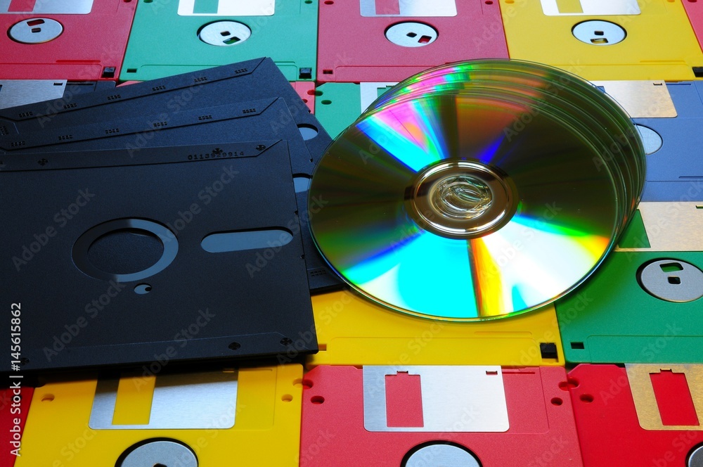 Old diskette 5 25 inches with 3.5 floppy disks of various colors with