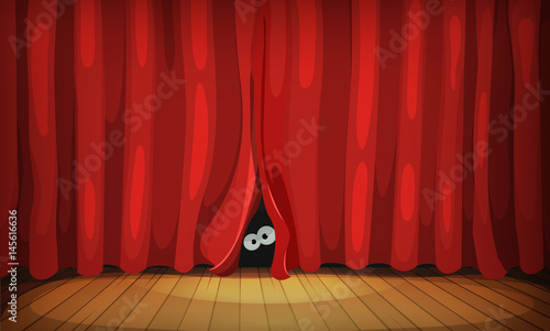 Eyes Behind Red Curtains On Wood Stage